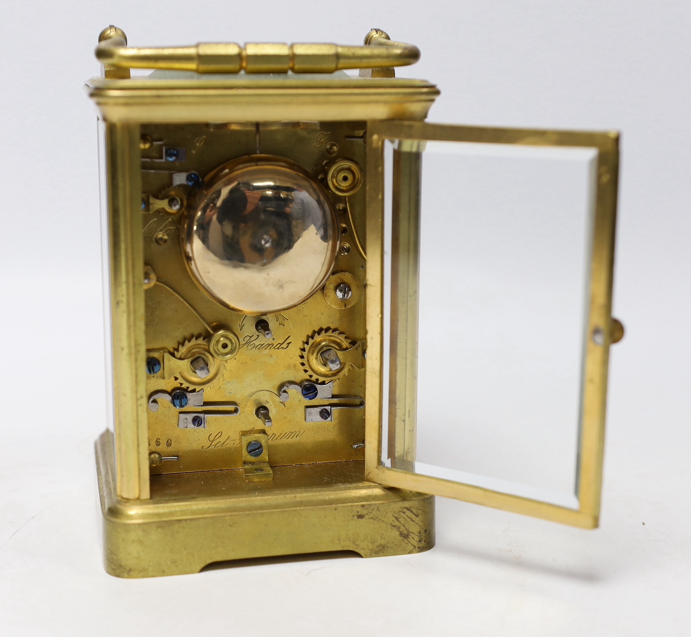 A late 19th century French brass repeating carriage clock, with alarm, 14.5cm high (handle down)